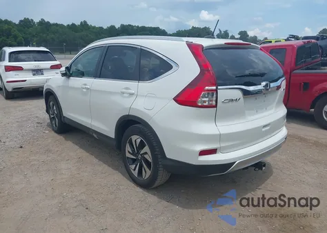 2016 Honda Cr-V Touring z USA, uszkodzony, nr VIN 5J6RM4H95GL118070